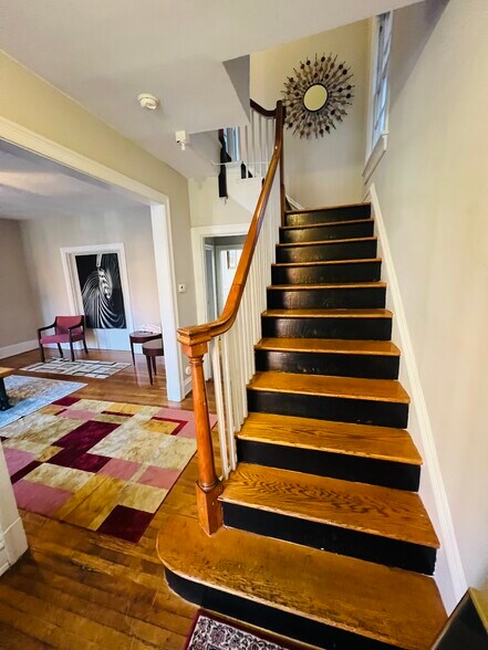 Stairs leading to Unit 2, 3, and 4. - 1130 W Grace St