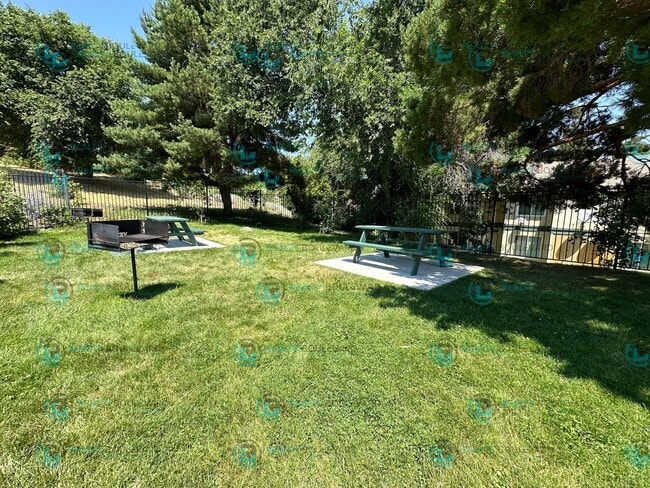 Building Photo - This delightful 2-bedroom, 1-bathroom condo perched upstairs offers an irresistible opportunity y...