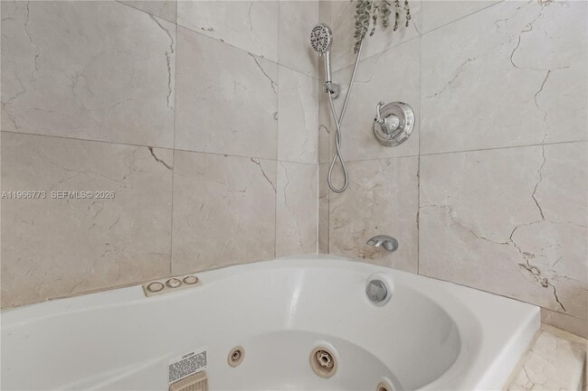 Building Photo - 5001 Collins Ave