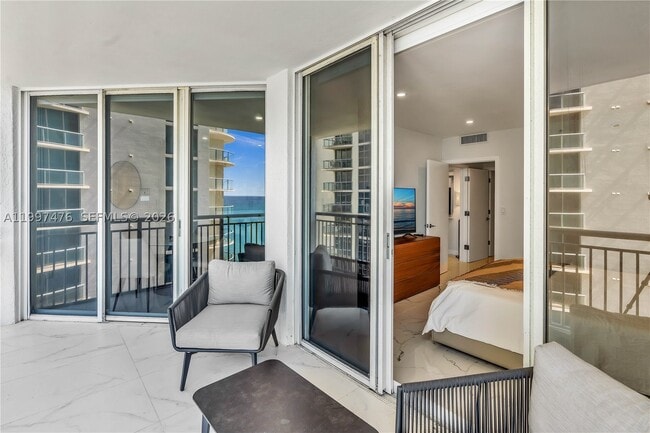 Building Photo - 17375 Collins Ave