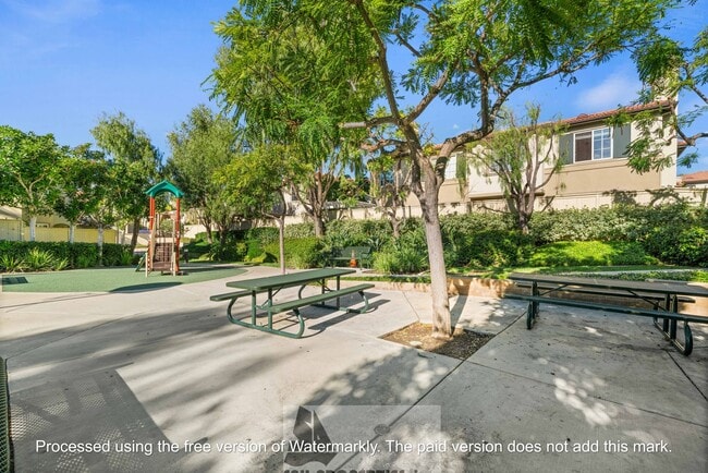 Building Photo - Welcome to this stunning 2-bedroom condo in gated community