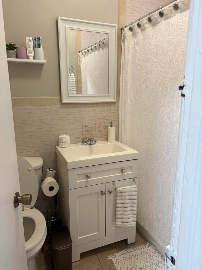 Building Photo - 121-123-123 W 25th St