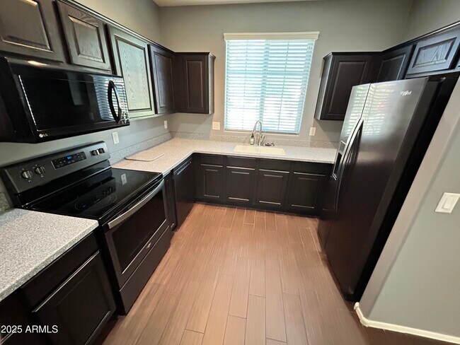 Building Photo - 9123 W Meadow Dr