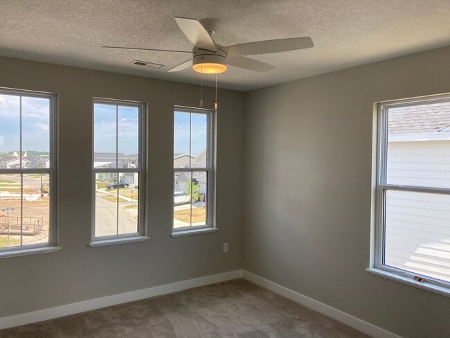 Building Photo - Spacious 4-Bedroom Home with 2-Car Garage & Yard