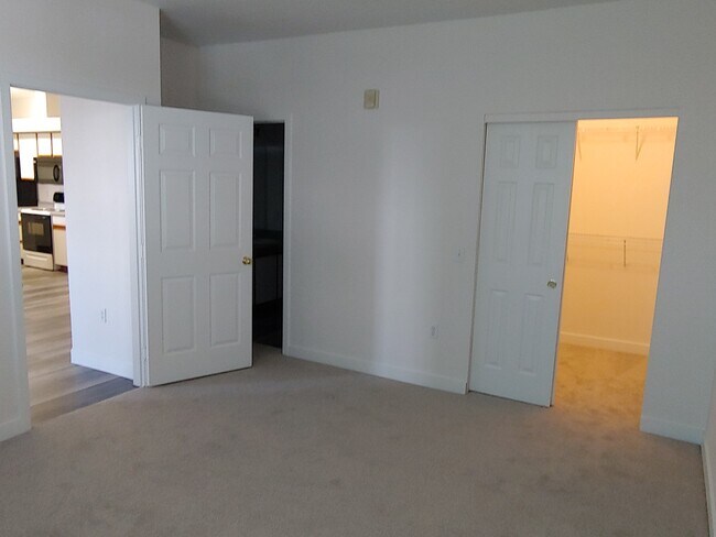 The Master Bedroom and Walk-In Closet - 18989 E Warren Dr