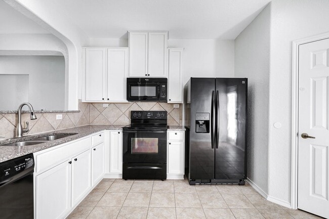 Building Photo - ***APPLICATION CURRENTLY UNDER REVIEW***Luxurious Move-In Ready Home with Versatile Living Spaces
