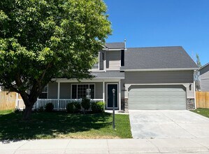 Building Photo - 4 Bedroom Home with Bonus Room Potential & RV Parking!