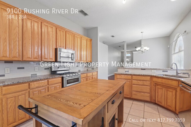 Building Photo - 9100 Rushing River Dr