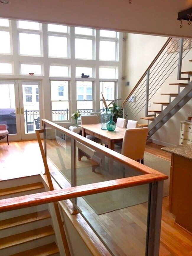 Building Photo - Logan Circle Light Filled One Bedroom with Den Loft with Balcony and Parking!