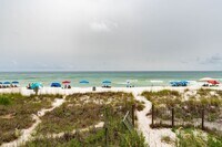 Building Photo - Stunning Beachfront 3-Bedroom Townhome!