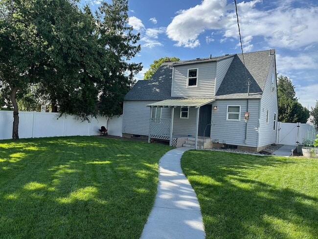 Building Photo - Ideally Located and Updated 4 Bed 2 Bath Fully-Fenced Home w/ Detached Garage/Shop!