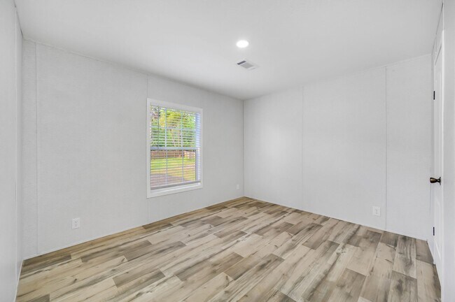 Building Photo - Experience exceptional living at its finest
