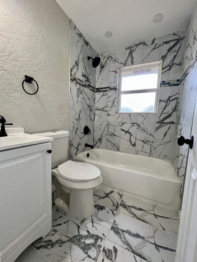 Building Photo - 4817 NW Pollard- COMING SOON!