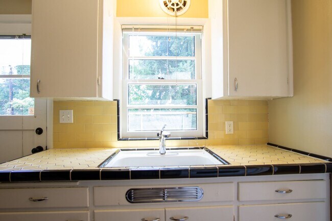 Building Photo - In the Heart of NW-Mid-Century 2Bdr Lives ...
