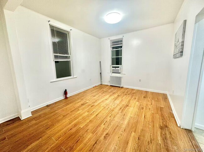 Building Photo - 18-17 125th St