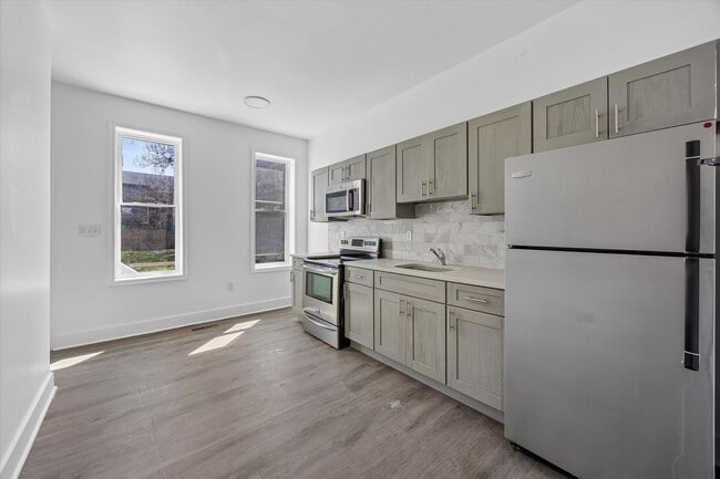 Building Photo - 2BR/3BA House | Updated Kitchen | Low Upfront Cost