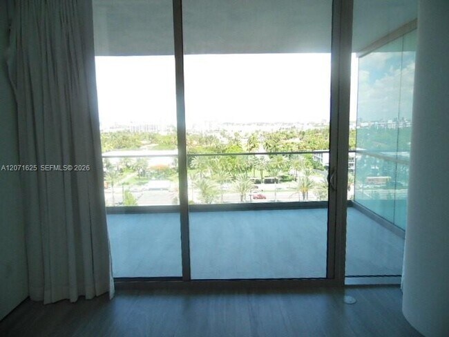 Building Photo - 10201 Collins Ave