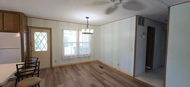Building Photo - 2 bed 2 baths with carport