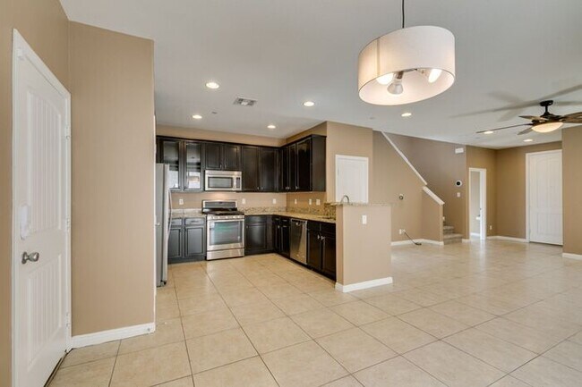 Building Photo - Better Than New with Stunning Designer Upgrades Throughout!