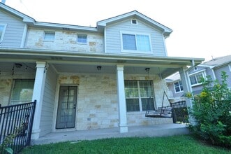 Building Photo - All appliances included! Gated lock and leave condo community in North Austin