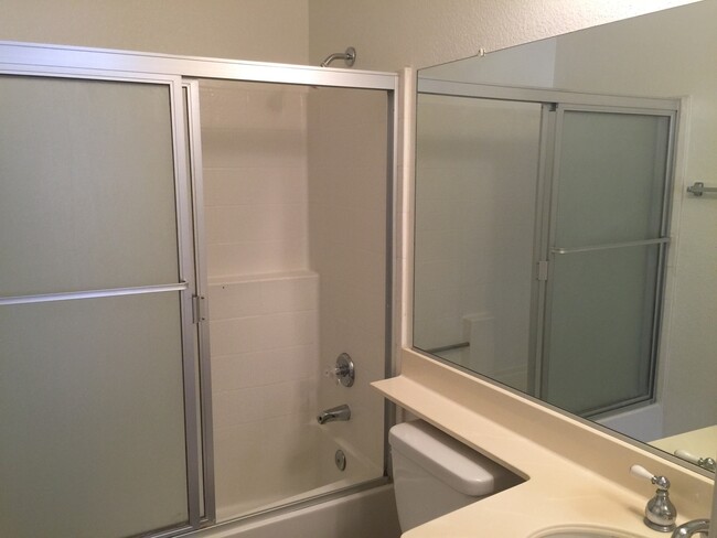 Building Photo - Cute & Private End Unit 3+2.5 Light & Brig...