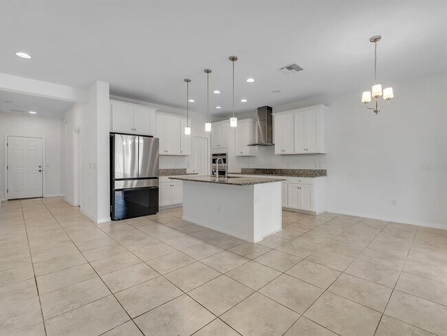 Building Photo - 7323 Pool Compass Loop