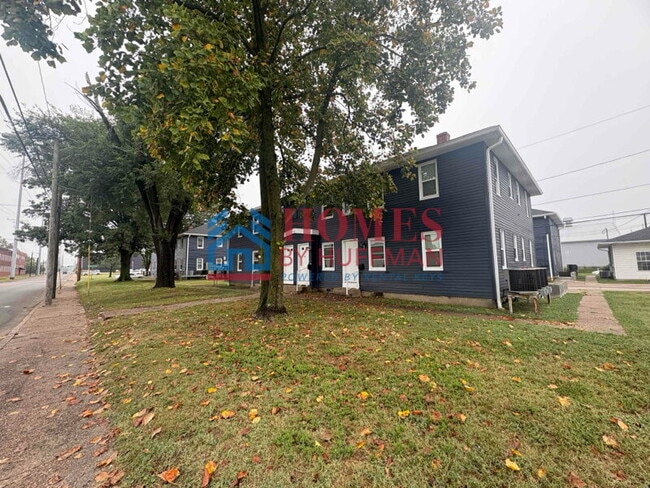 Building Photo - One Bedroom Apartment | Laundry Facility | Utilities Included