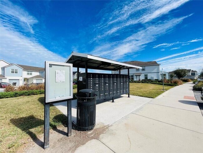Building Photo - Immaculate Townhome · Dual En-Suite Bedrooms + Flex Loft · Cable & Internet Included · 3.5 Miles ...