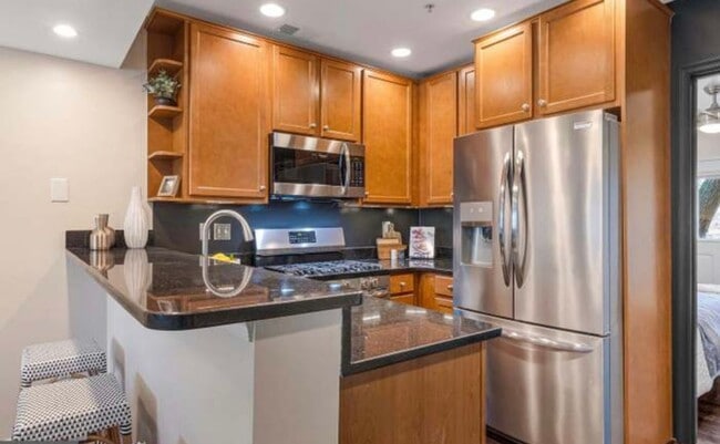 Building Photo - Bright, modern Capitol Hill 1 bed/1 bath condo with private outdoor space and secured parking