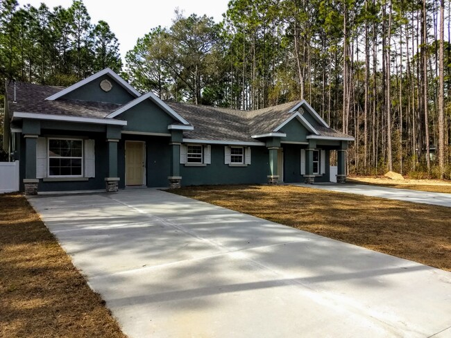 Street View with Double Driveway - 9356 N Peachtree Way