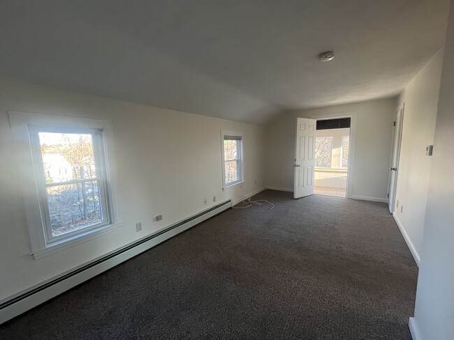 Large Living room with door to 3 Season Porch - 33-2 Beaumont St