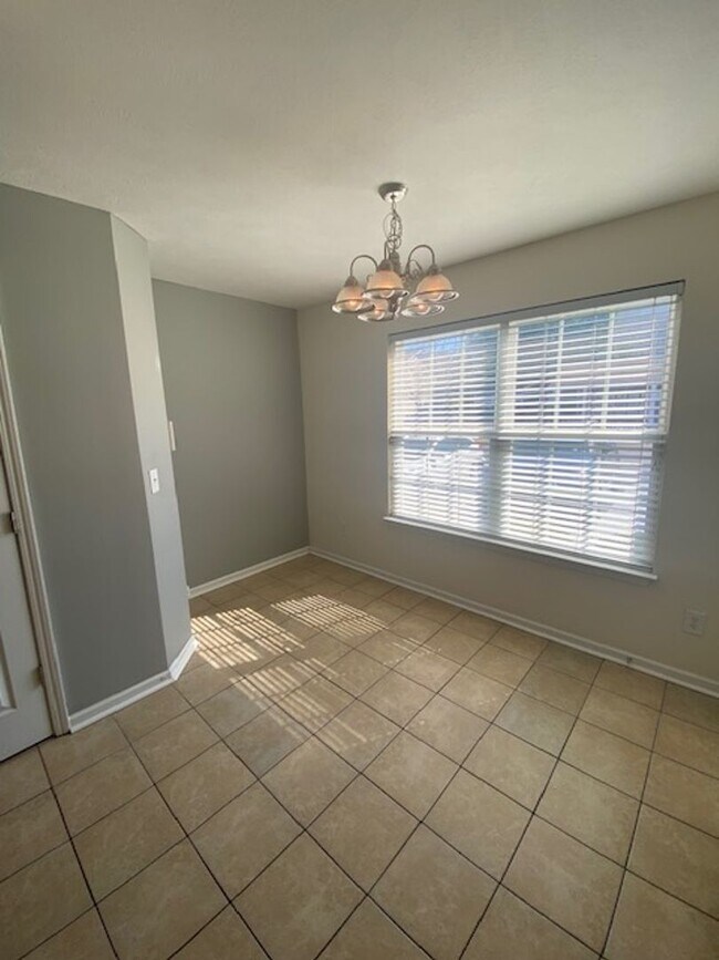 Building Photo - End Unit Townhouse Now Available at Barnes...
