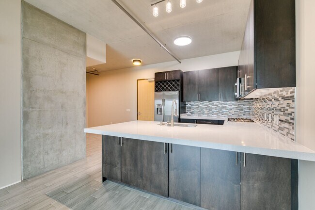 Building Photo - Modern High-Rise Living at Juhl with City Views