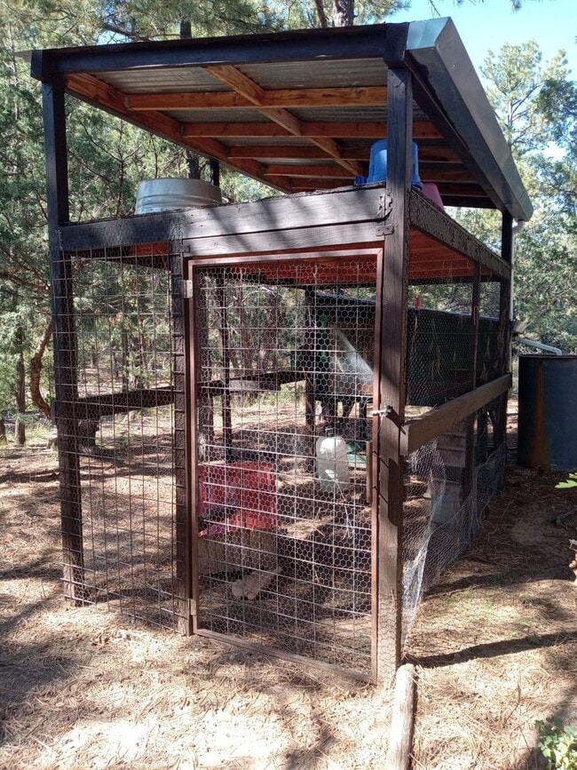 Building Photo - COZY HOME IN THE BEAUTIFUL TOWN OF TIJERAS | Showings available NOW!!