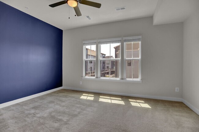 Building Photo - Luxury 4-Story Townhome with Rooftop Terrace!