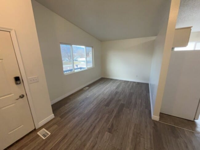 Building Photo - Beautiful ranch style home that has a finished basement and stunning views from the front deck!