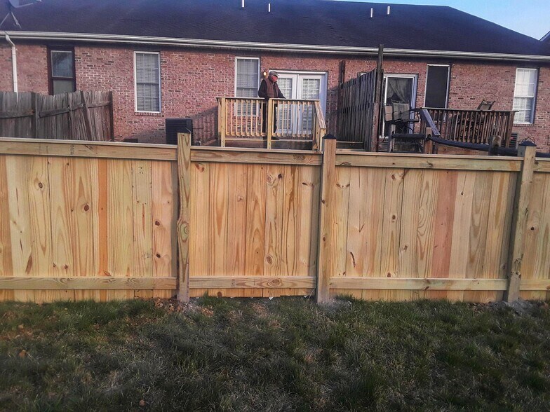 New fence with gate - 334 Lora Dr