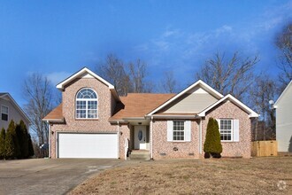 Building Photo - Pet Friendly Three Bedroom with Bonus!