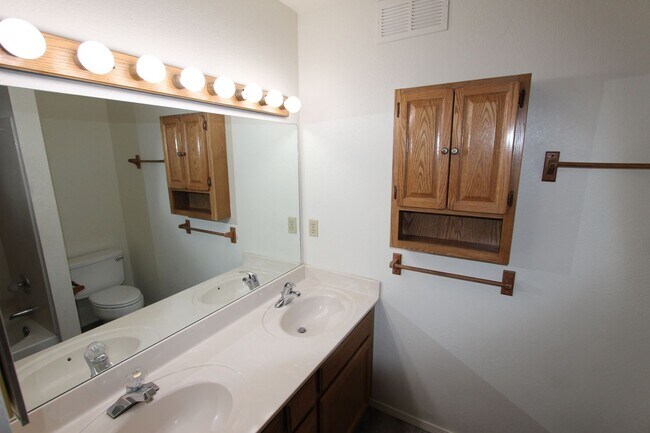 Building Photo - Bright 2BR Townhome in Boyington Heights | Private Balcony + Fenced Backyard