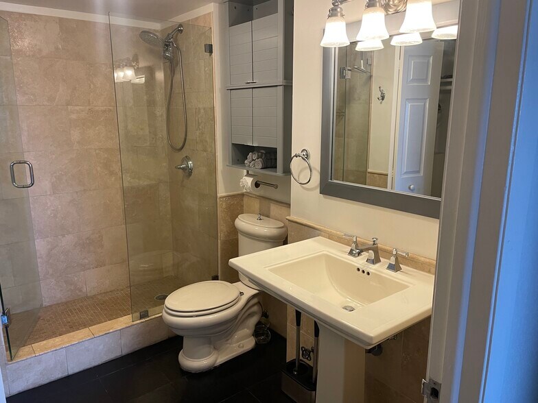 natural stone walk in large shower - 1500 Bay Rd