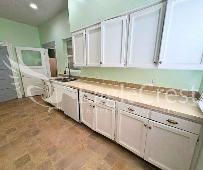 Building Photo - Charming Historic 4-Bedroom Home with Fenced Yard & Chicken Coop