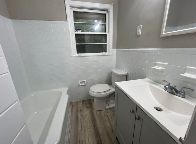 Building Photo - COMING SOON: Classic charm, peaceful living, your Forest Park retreat awaits in this spacious 3-b...