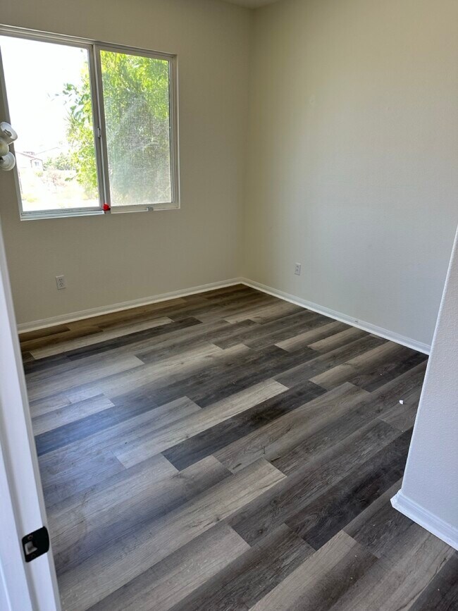 Building Photo - 13210 Petunia Avenue