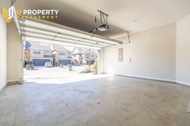 Building Photo - Luxury Townhome- wood flooring. Great location