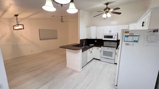 Building Photo - 10669 Boca Entrada Blvd