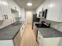 Building Photo - Ground Floor Two-Bedroom/One-Bathroom Cond...
