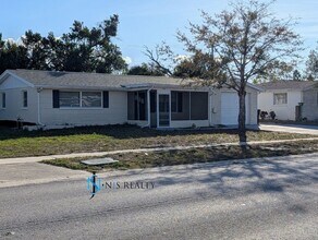 Building Photo - JUTS REDUCED!!!   3/1.5/1 1113 Sq. Ft. with UPDATED bathrooms and kitchen with GRANITE, LARGE bac...