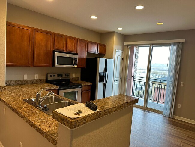 Building Photo - Large garage with attached spacious 2 bedroom townhome