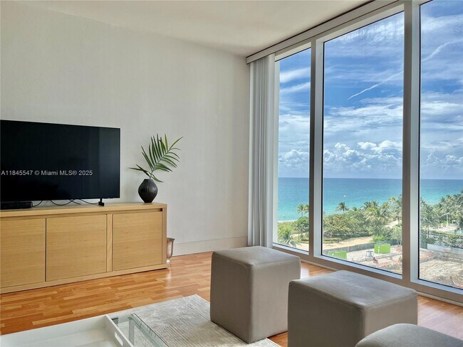 Building Photo - 10275 Collins Ave