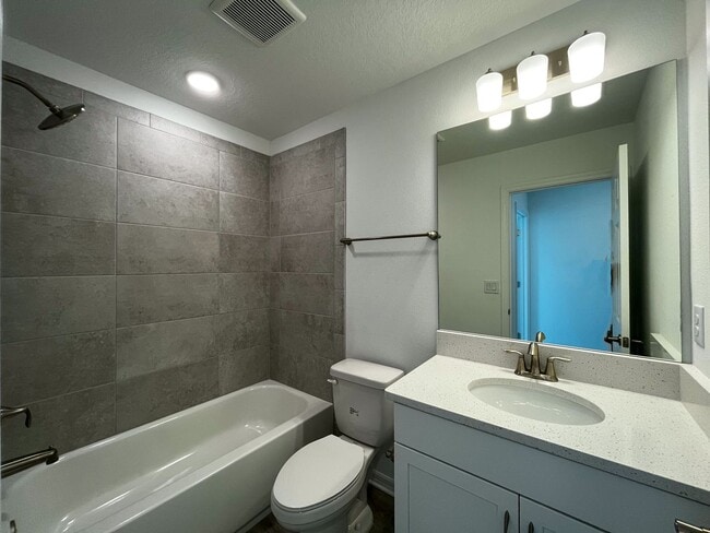 Building Photo - Townhome with garage, excellent location, community pool and more